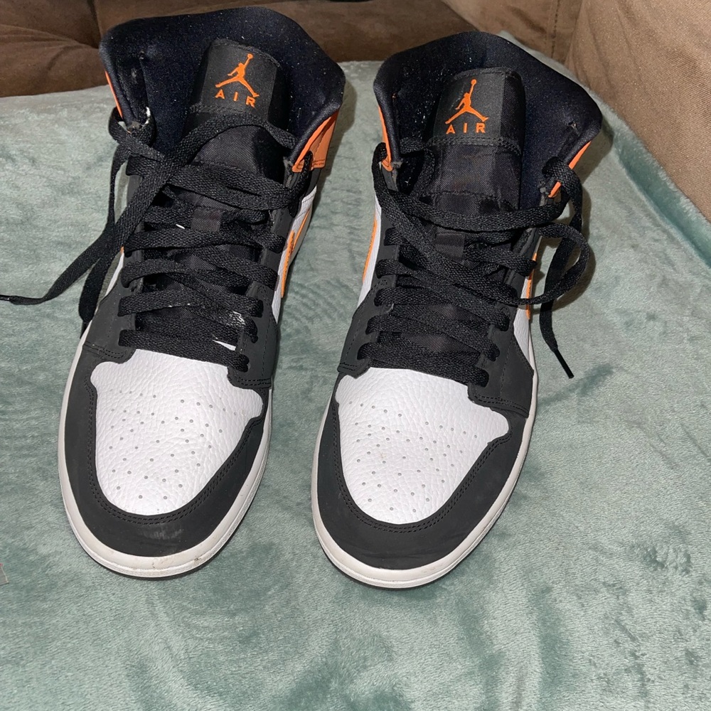 Orang black and white mid Jordan ones size men 11